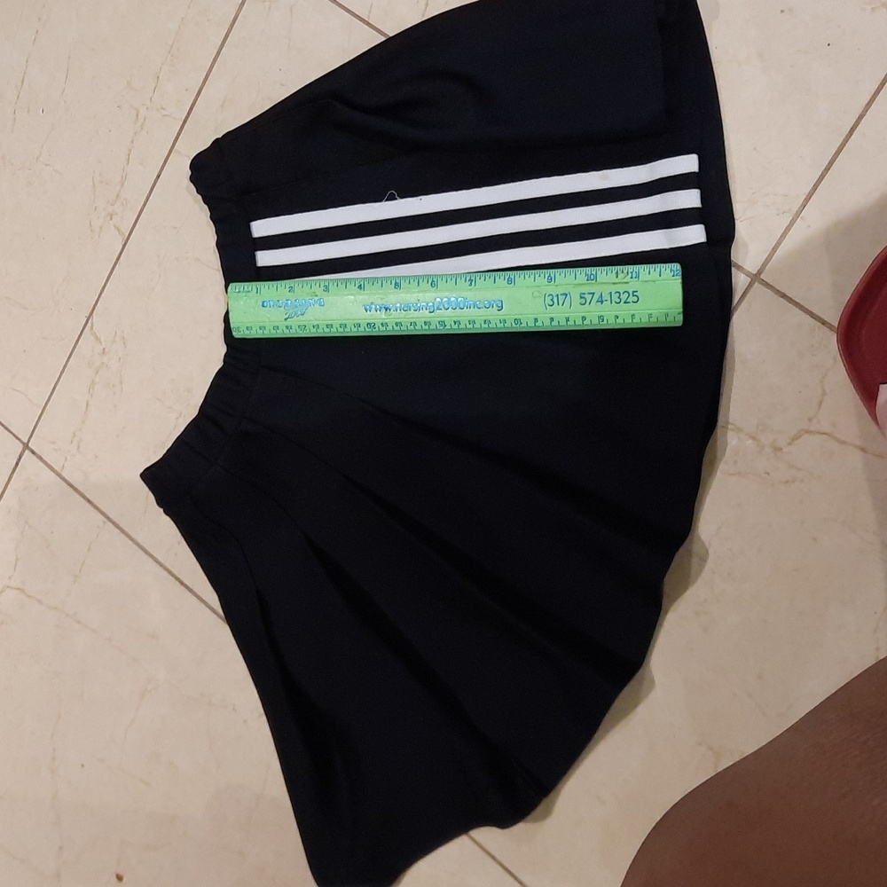 AUTHENTIC VARSITY PROFESSIONAL CHEERLEADER SKIRT SEXY BLACK WHITE XS